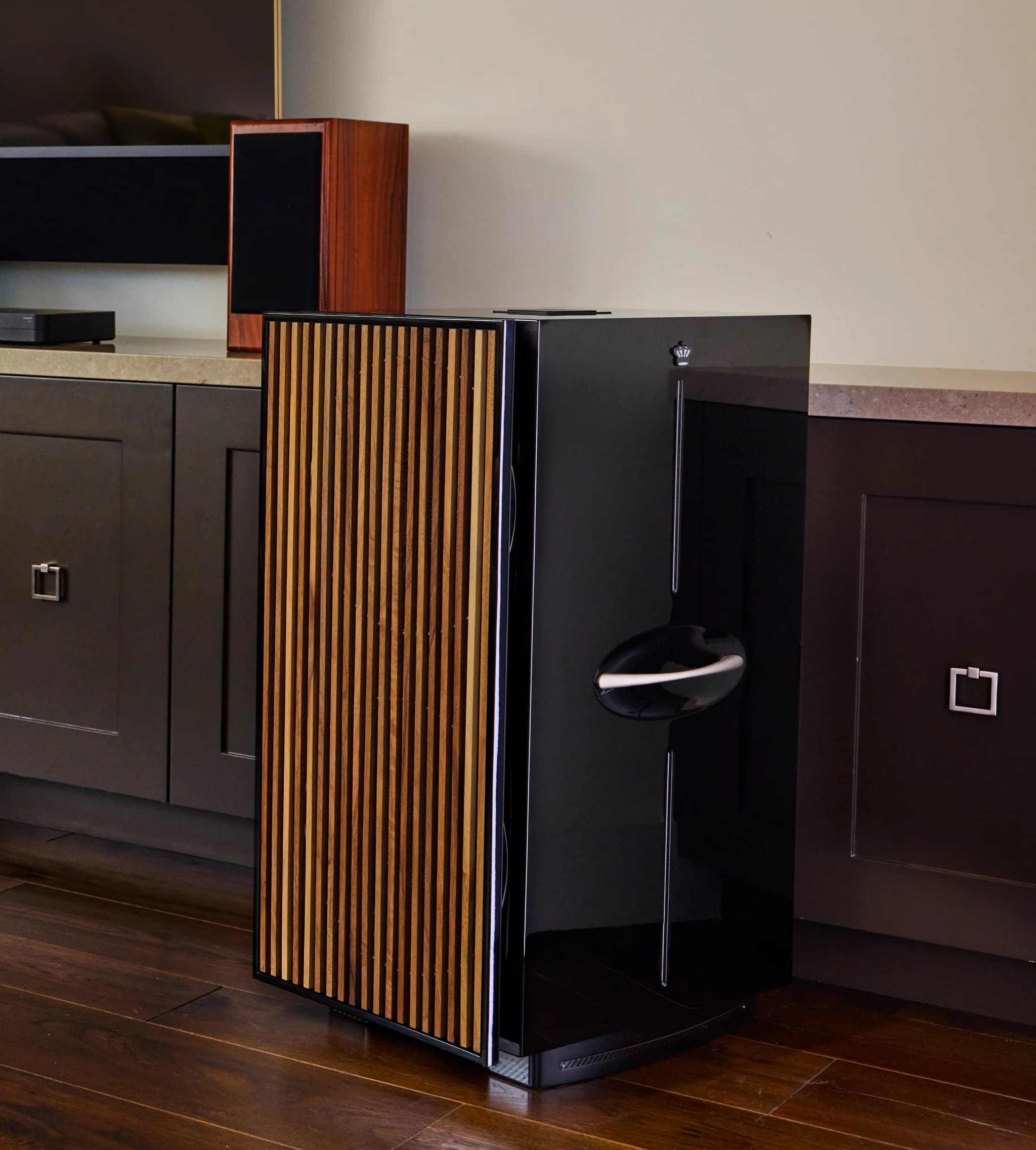 Official REL REL 212 Black Label shown in a styled room setting.