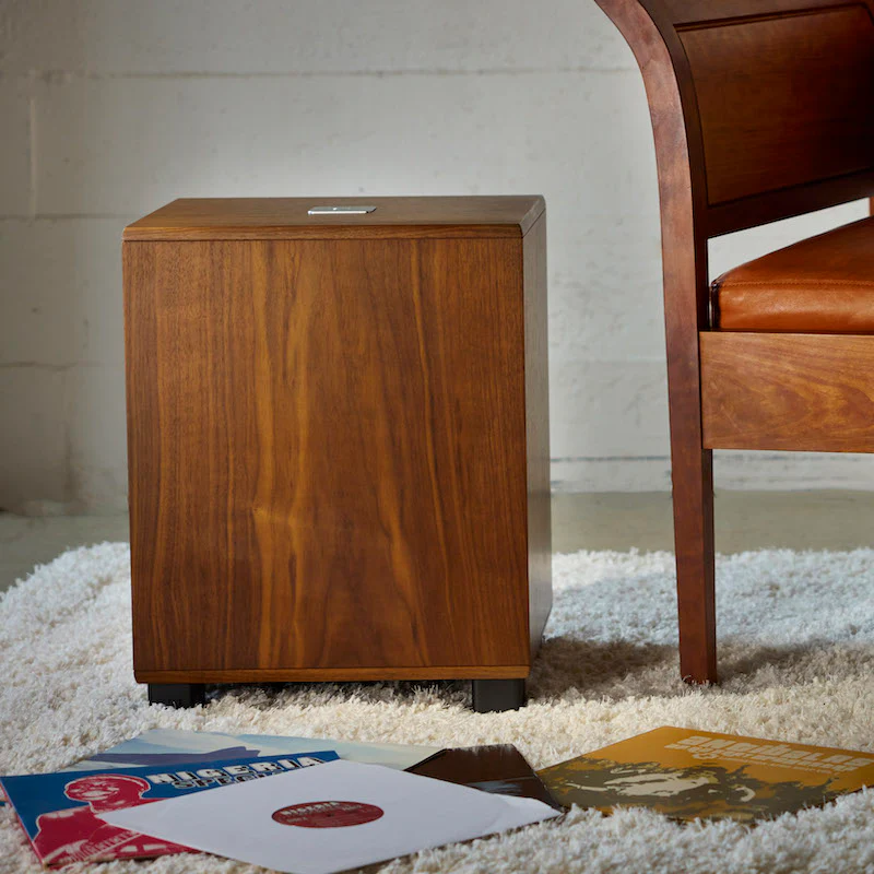 Official REL Classic 99 shown in a styled room setting.