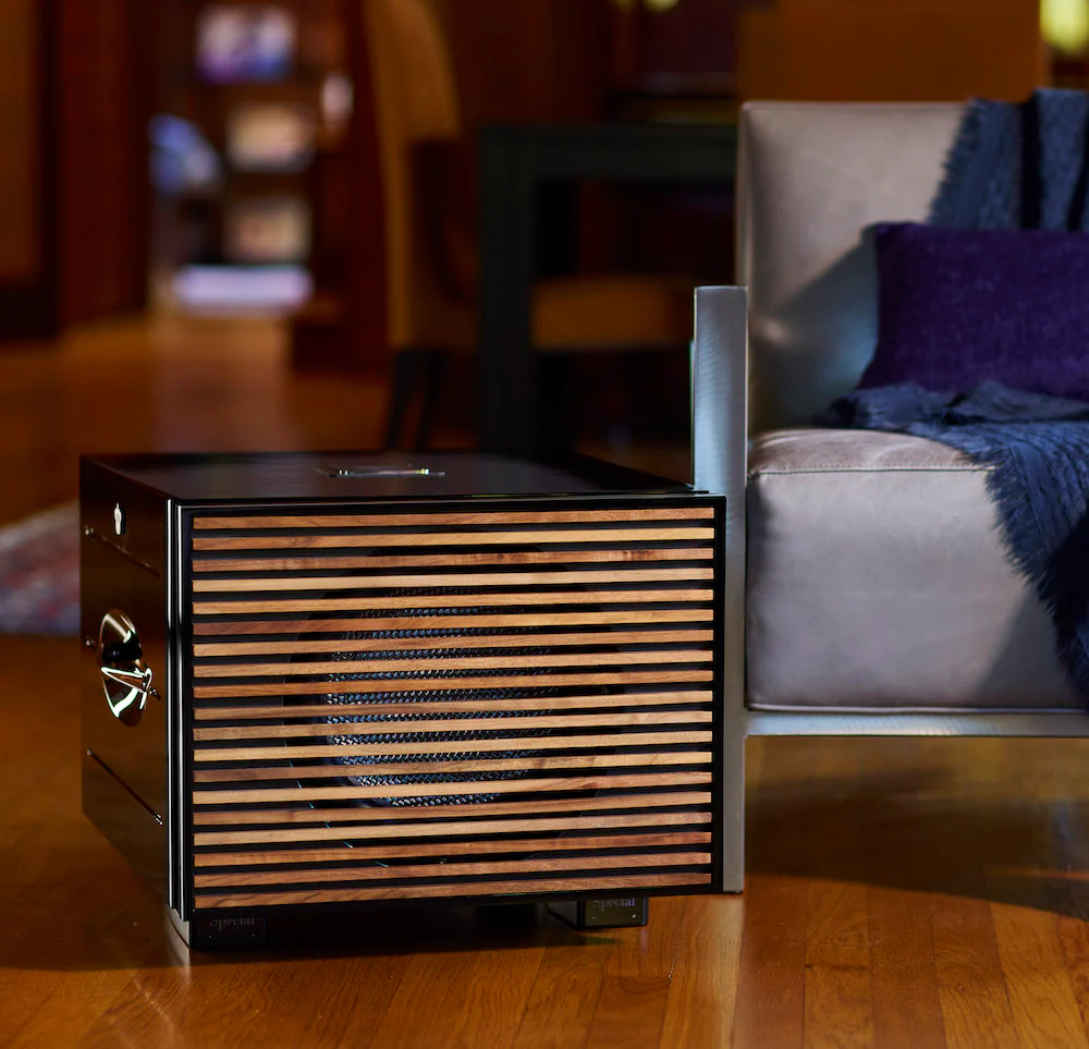 Official REL REL Carbon Special Black Label shown in a styled room setting.