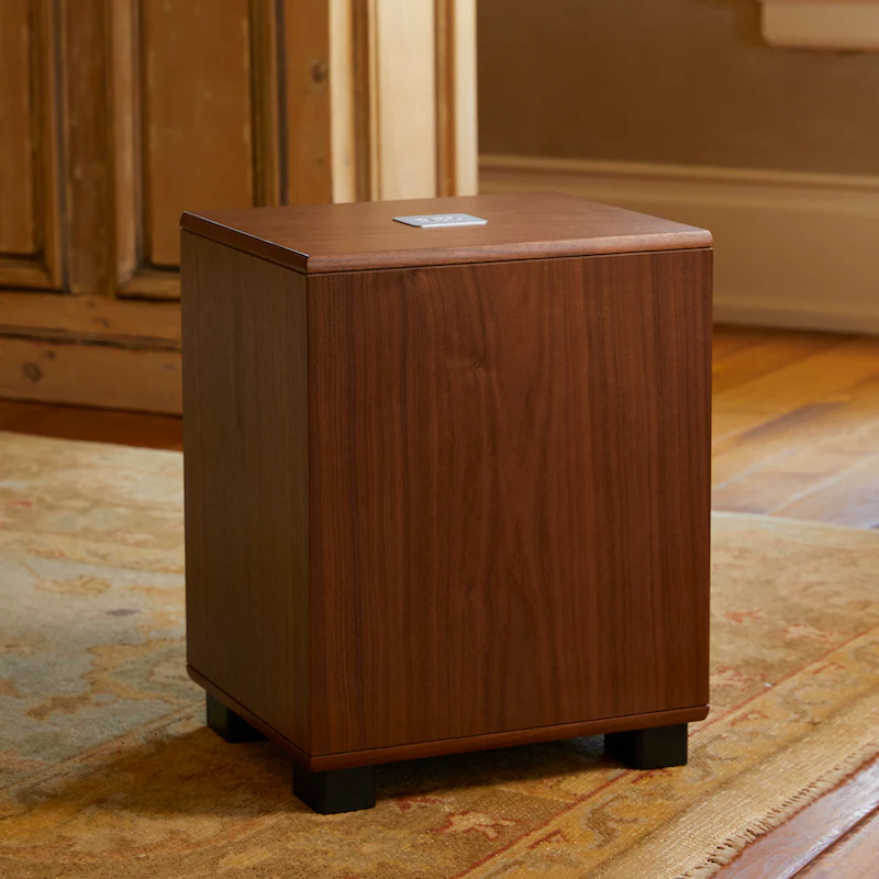 Official REL Classic 98 shown in a styled room setting.