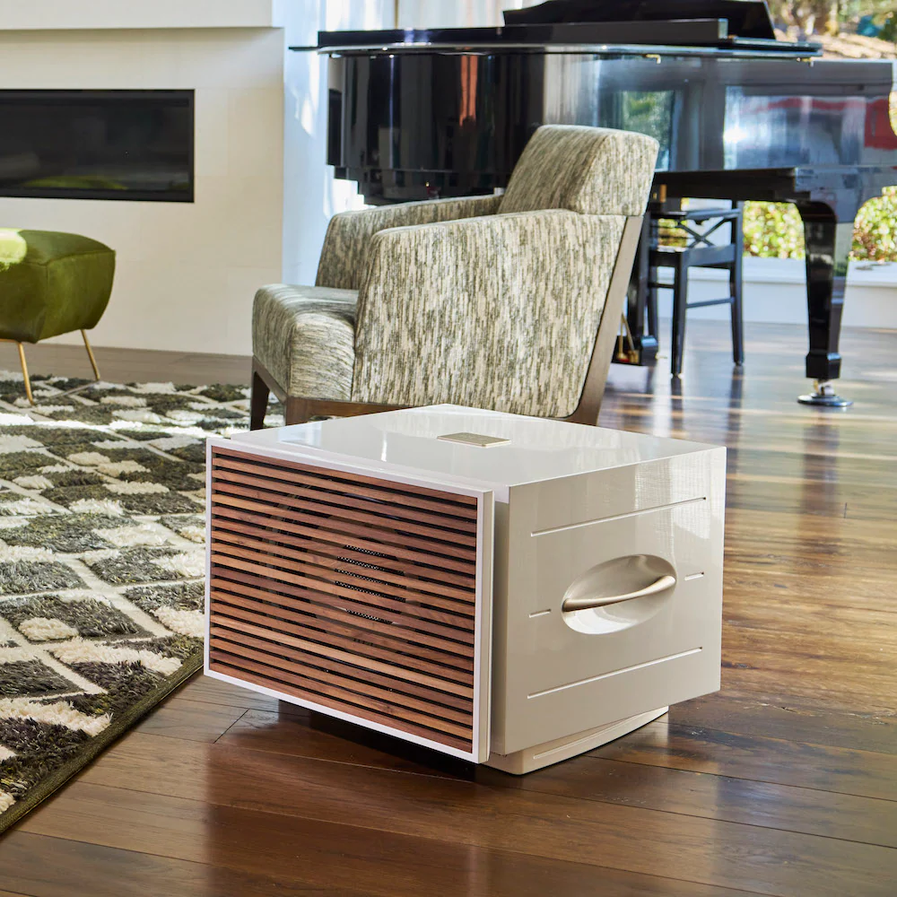 Official REL REL S/850 shown in a styled room setting.